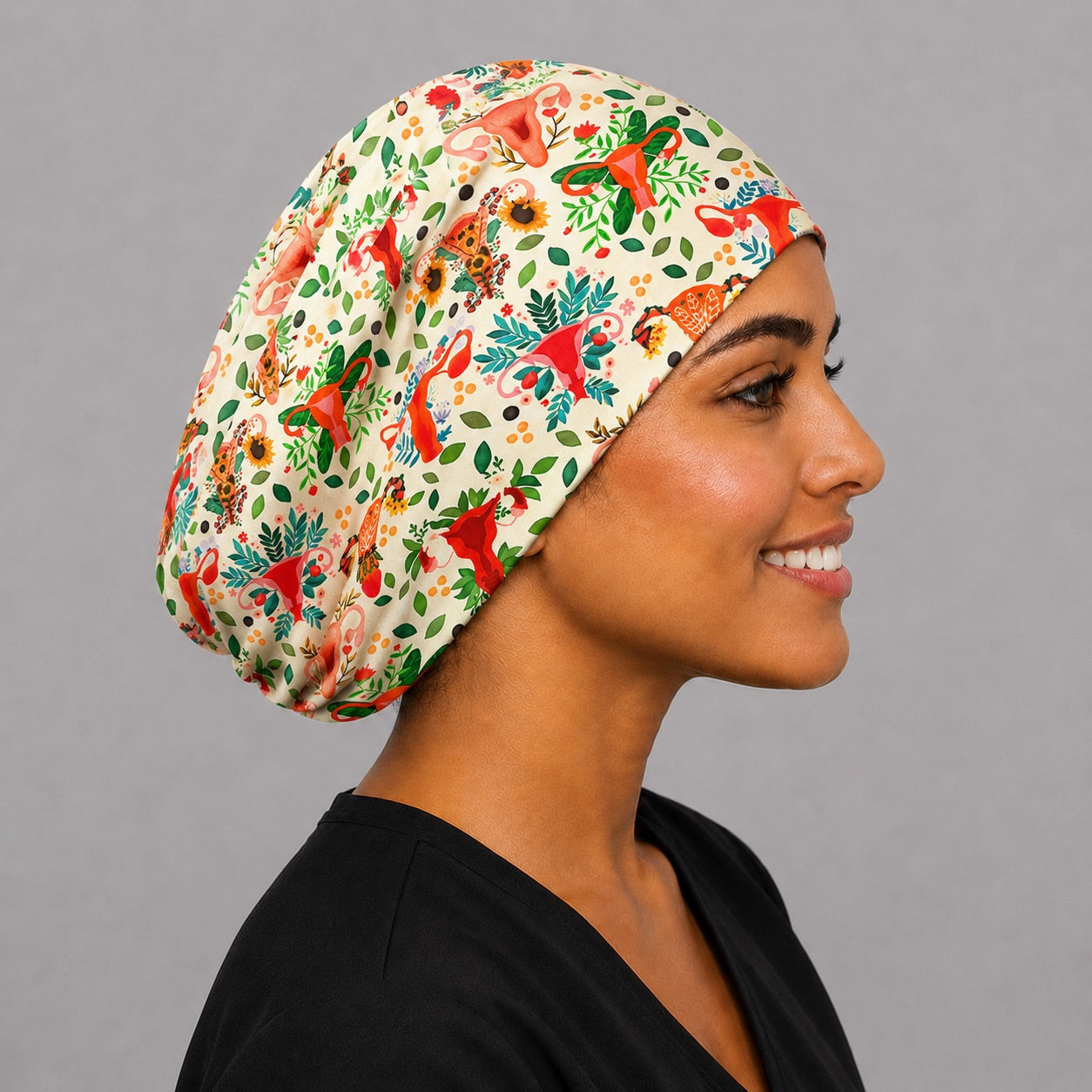 Back view of uterus floral euro scrub cap showing full coverage and elastic gathered back — handmade-in-USA OB-GYN surgical hat.