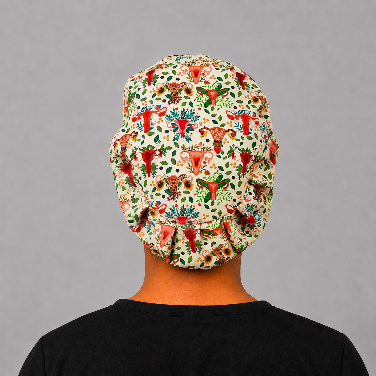 Front view of uterus floral euro scrub cap for women — adjustable OB-GYN and labor-and-delivery surgical hat, handmade in USA.