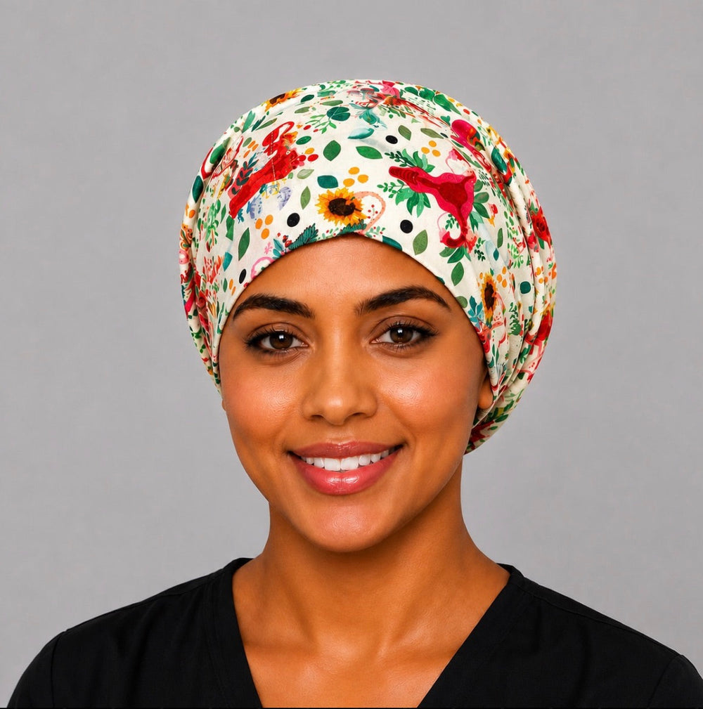 Woman wearing a uterus floral Euro scrub cap, front view — anatomical uterus and sunflower print on cream, adjustable OB-GYN surgical hat for women
