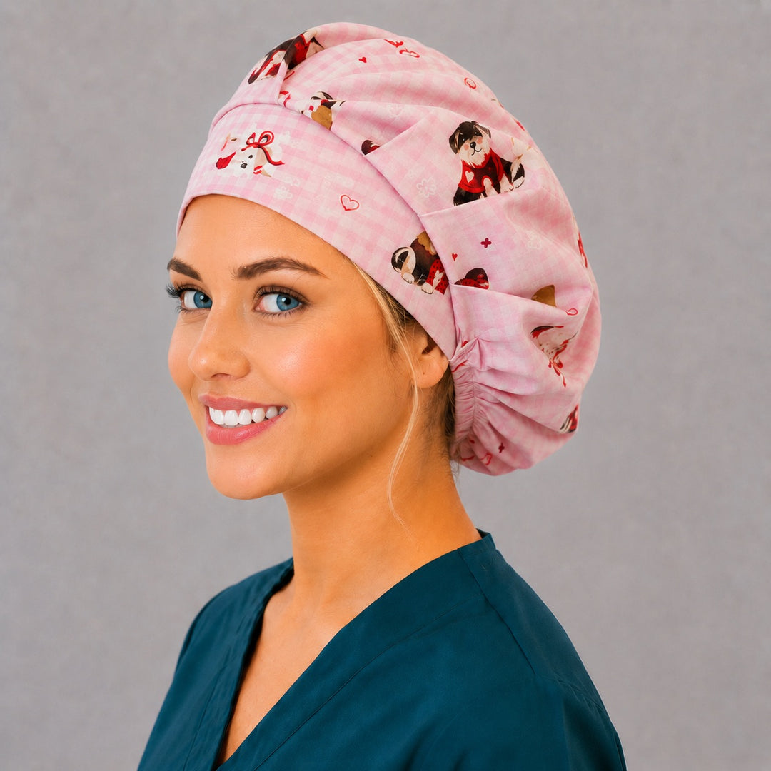 Valentine dog gingham bouffant scrub cap, left angled smiling view — pups in bows and sweaters print for OR nurses and vet teams