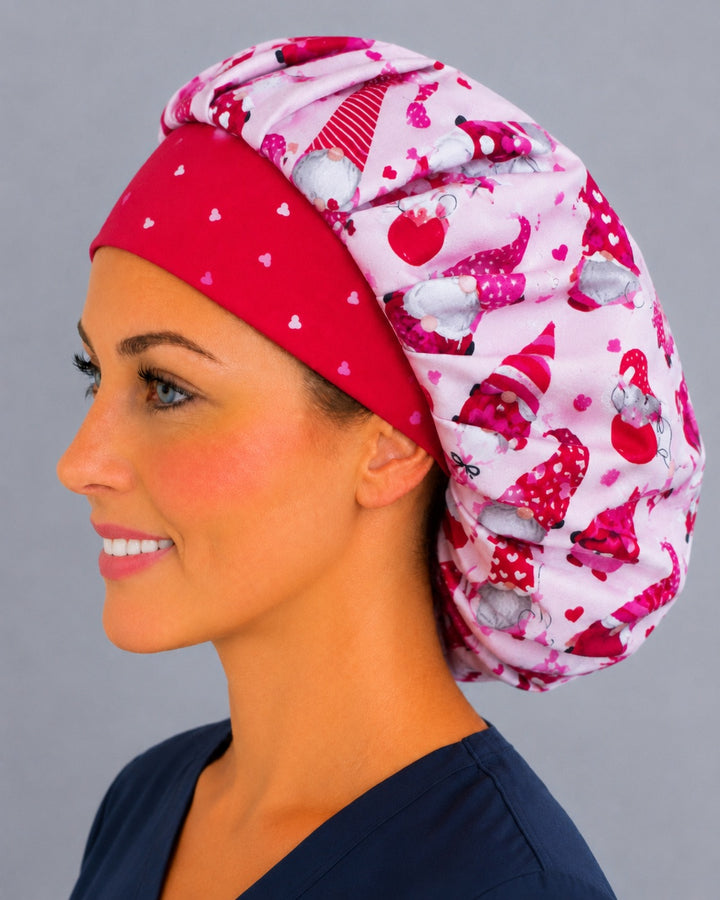 Back view of the Valentine gnomes bouffant scrub cap — full roomy fit showing gnomes with LOVE and XO banners, hearts and balloons on pink