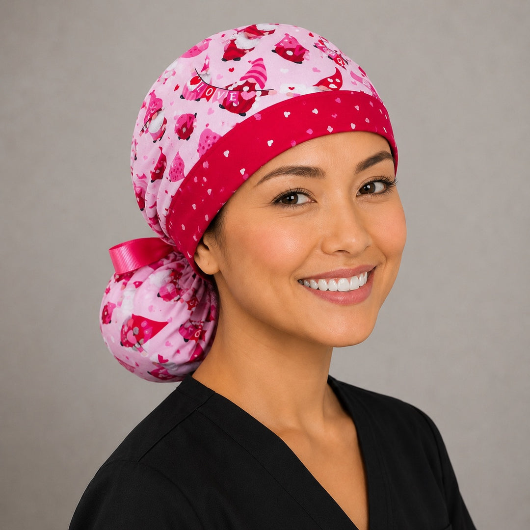 Valentine gnomes ponytail scrub cap right side profile with full ponytail pouch of red and pink gnomes and hearts and long pink ribbon ties