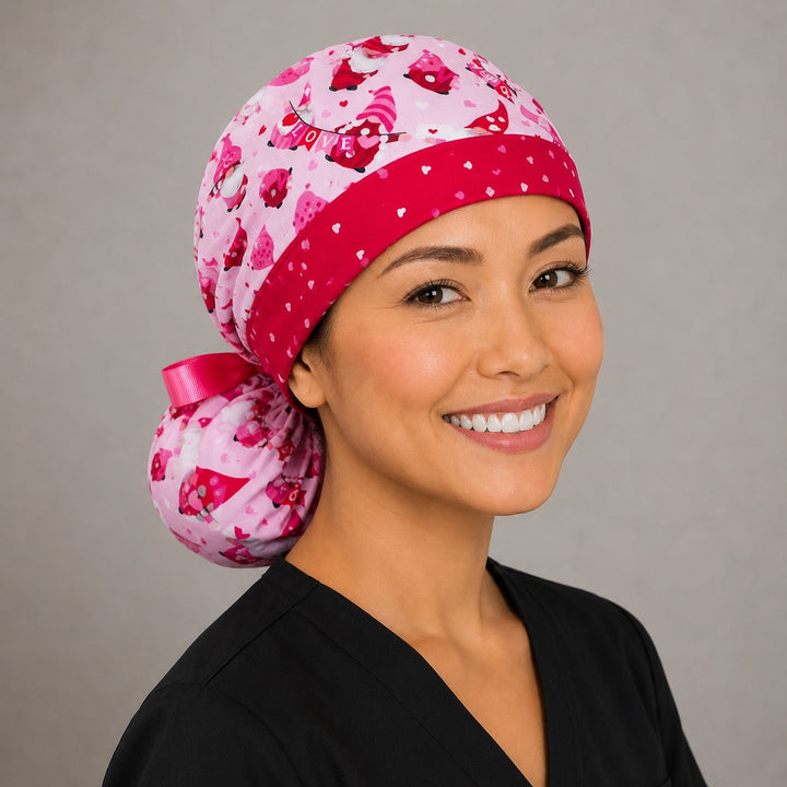 Valentine gnomes ponytail scrub cap right side profile with full ponytail pouch of red and pink gnomes and hearts and long pink ribbon ties