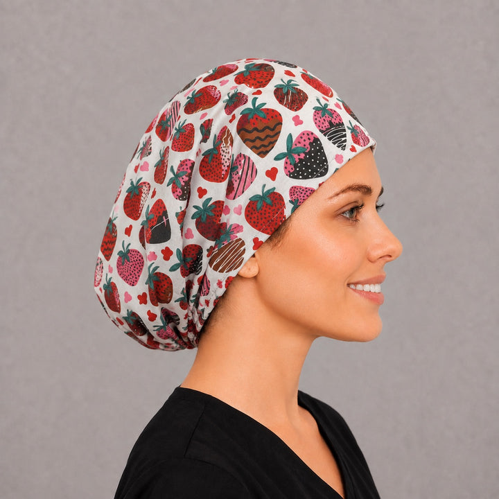 Valentine strawberry Euro surgical hat, right angled smiling view — handmade chocolate drizzle print cap, USA made