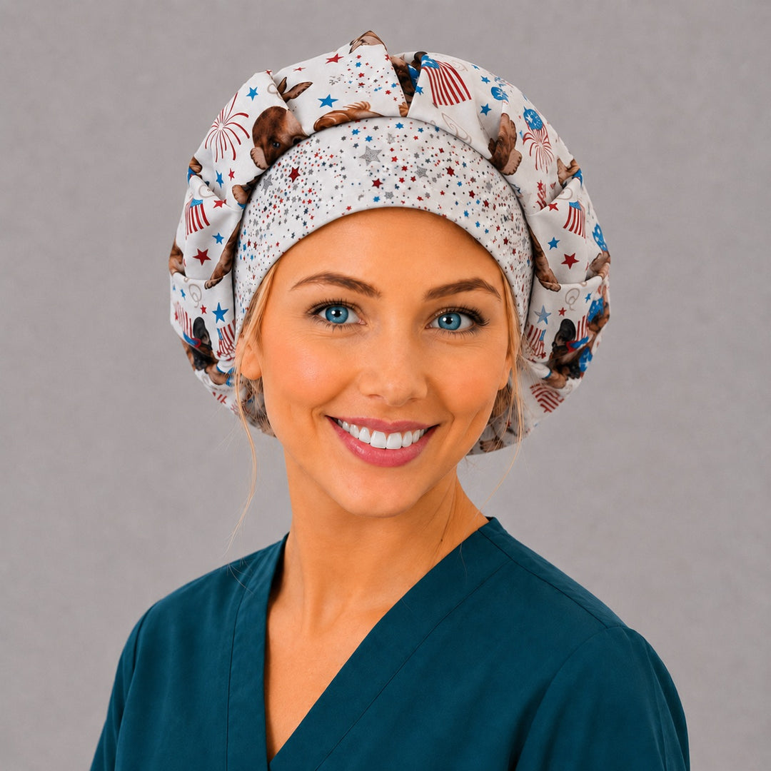 Veterinary patriotic dog bouffant scrub cap, front angled view — star band and flag puppy print, roomy elastic-back cap for vet techs