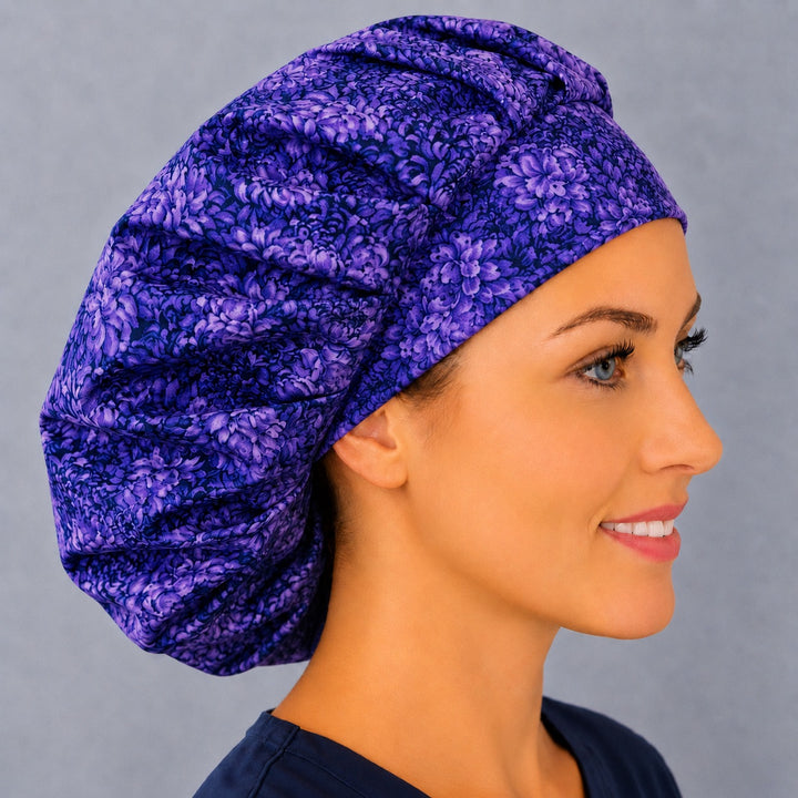 Right side profile of the violet chrysanthemum bouffant surgical hat — deep purple petal print, roomy breathable cotton cap for nurses