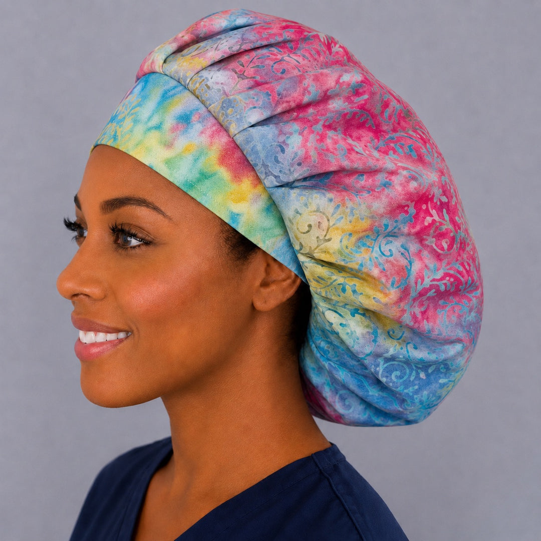 Watercolor batik bouffant cap for women, right side profile — handmade pastel candyland surgical cap, USA made