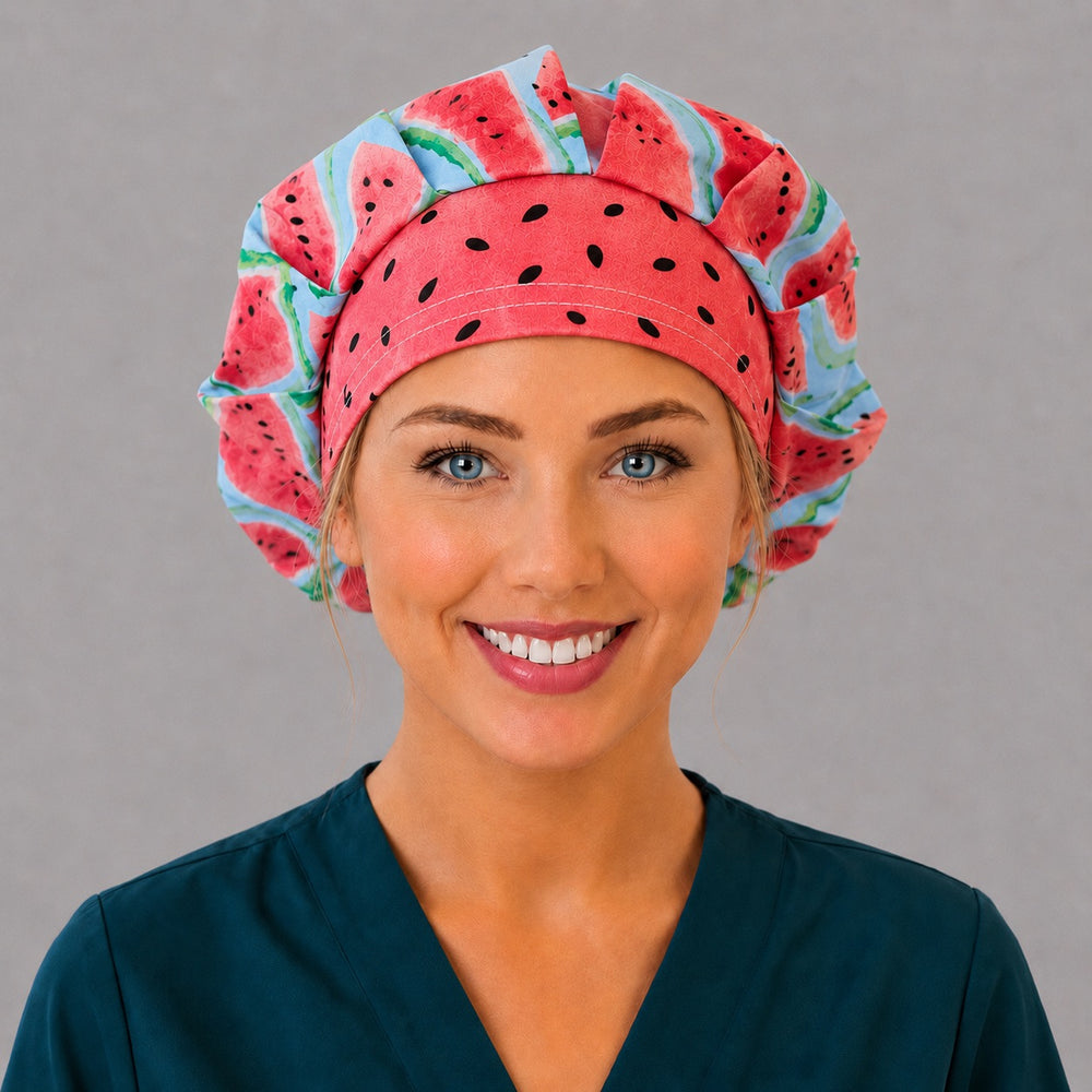 Woman wearing a watermelon bouffant scrub cap, front view — watercolor watermelon slices with pink seed band, adjustable women's surgical hat for long hair