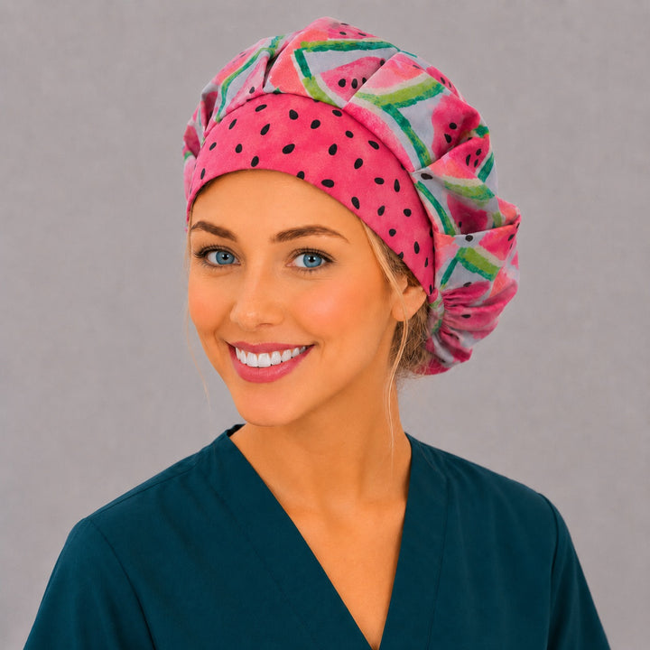 Watermelon bouffant scrub cap three-quarter smiling view — pink seed band with watercolor melon slices, roomy adjustable surgical hat for women