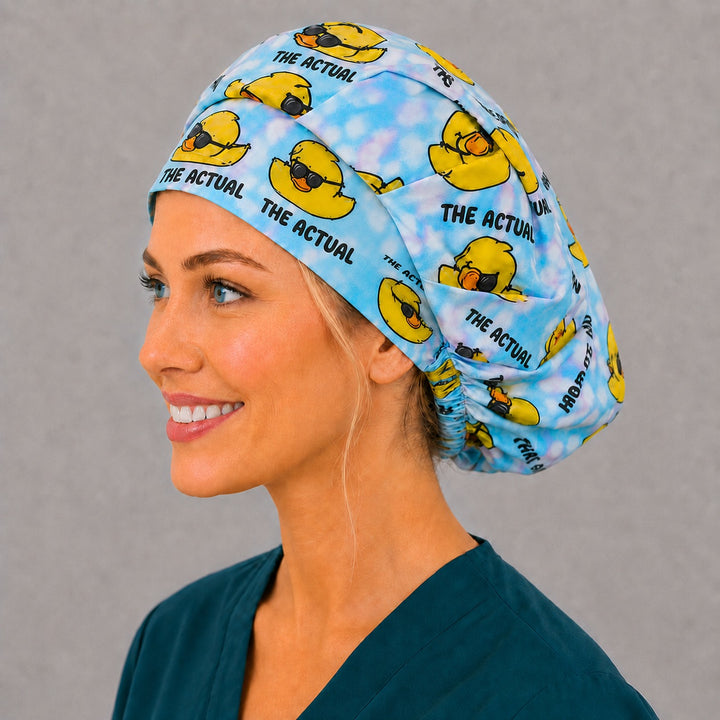 What in the Actual Duck bouffant cap for women, left side profile — handmade funny duck surgical cap, USA made