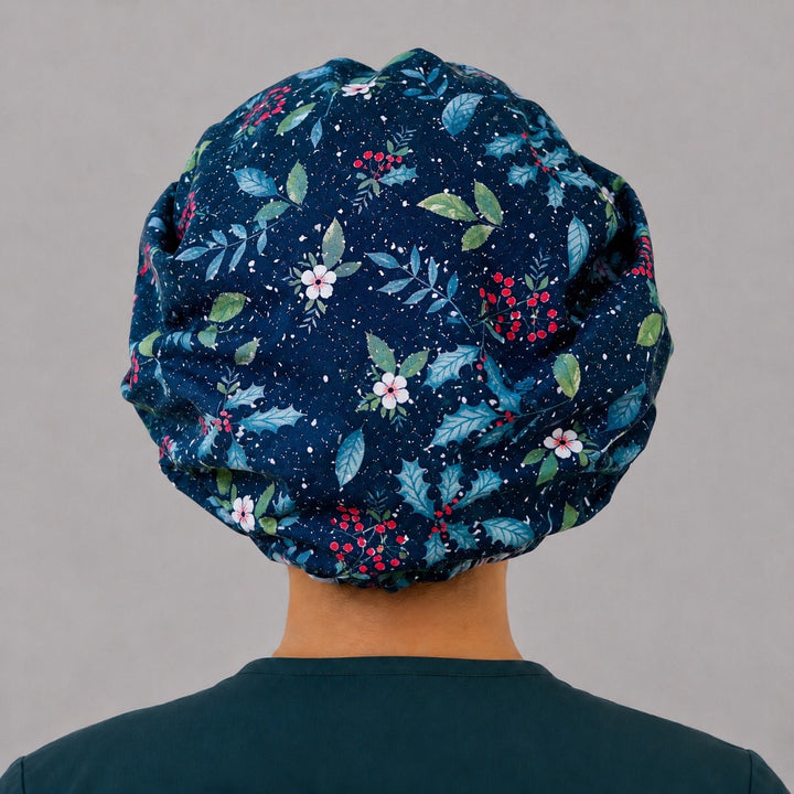 Back view of the winter holly bouffant scrub cap — full roomy fit showing glitter holly leaves, red berries and white blooms on navy