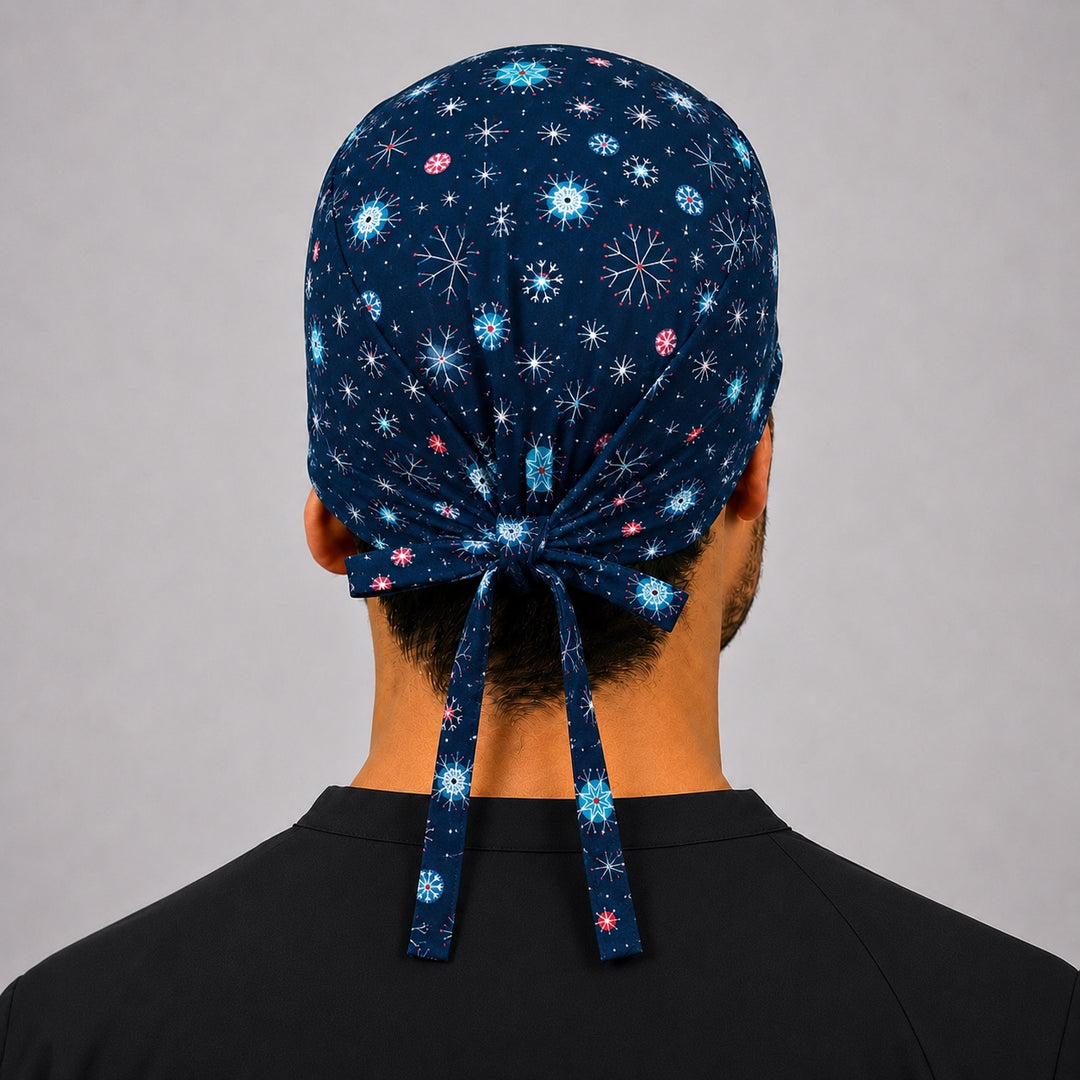 Back view of adjustable tie-back knot on navy winter snowflake Christmas scrub cap surgical hat for men