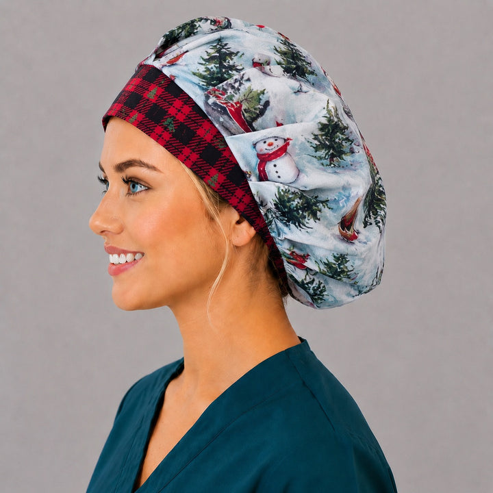 Back view of the winter snowman bouffant scrub cap — full roomy fit showing snowmen, red cardinals, holly and pine trees on snowy blue