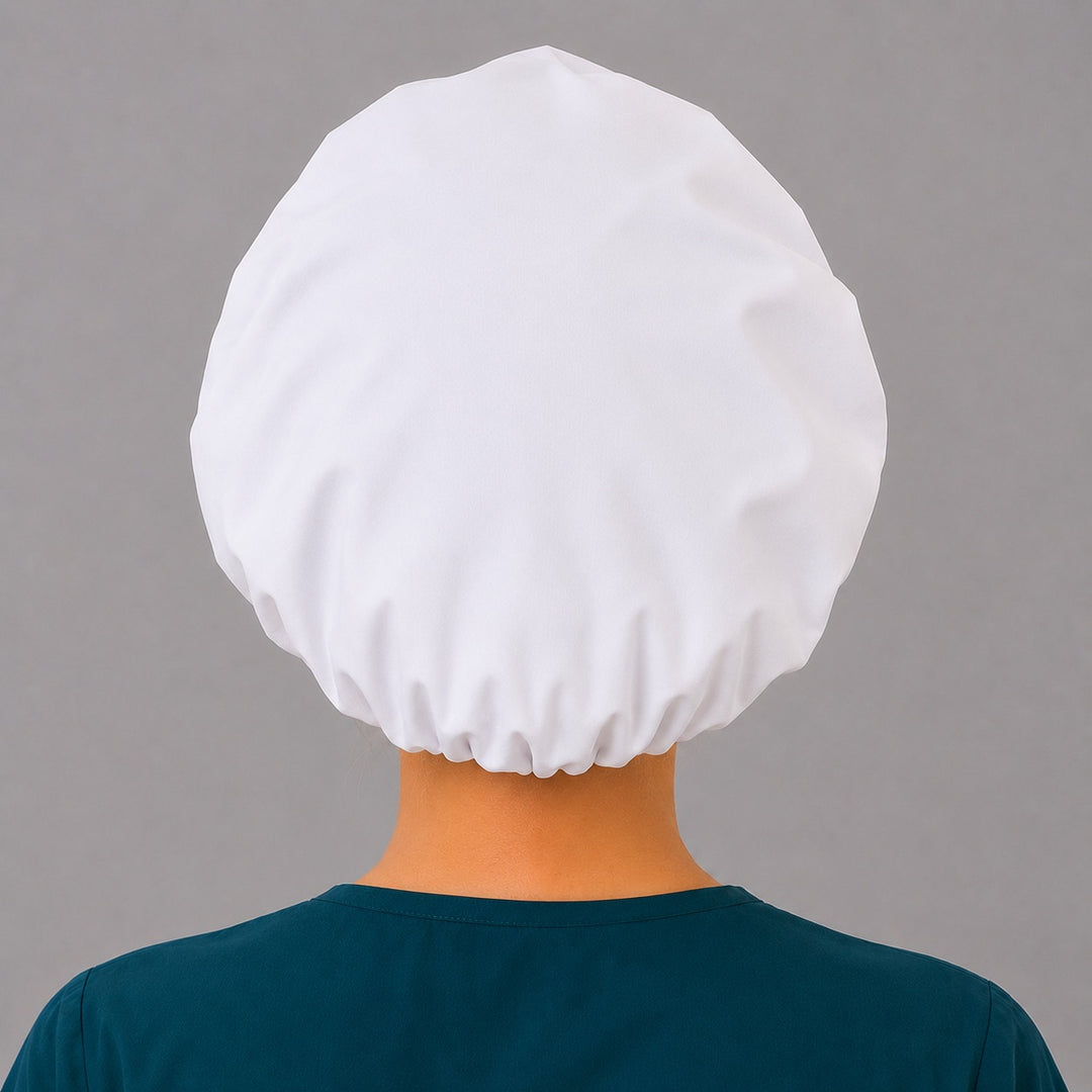 Winter white snowman bouffant scrub cap back view showing gathered snowy white crown with glitter flecks and elastic closure, OR World Christmas surgical hat
