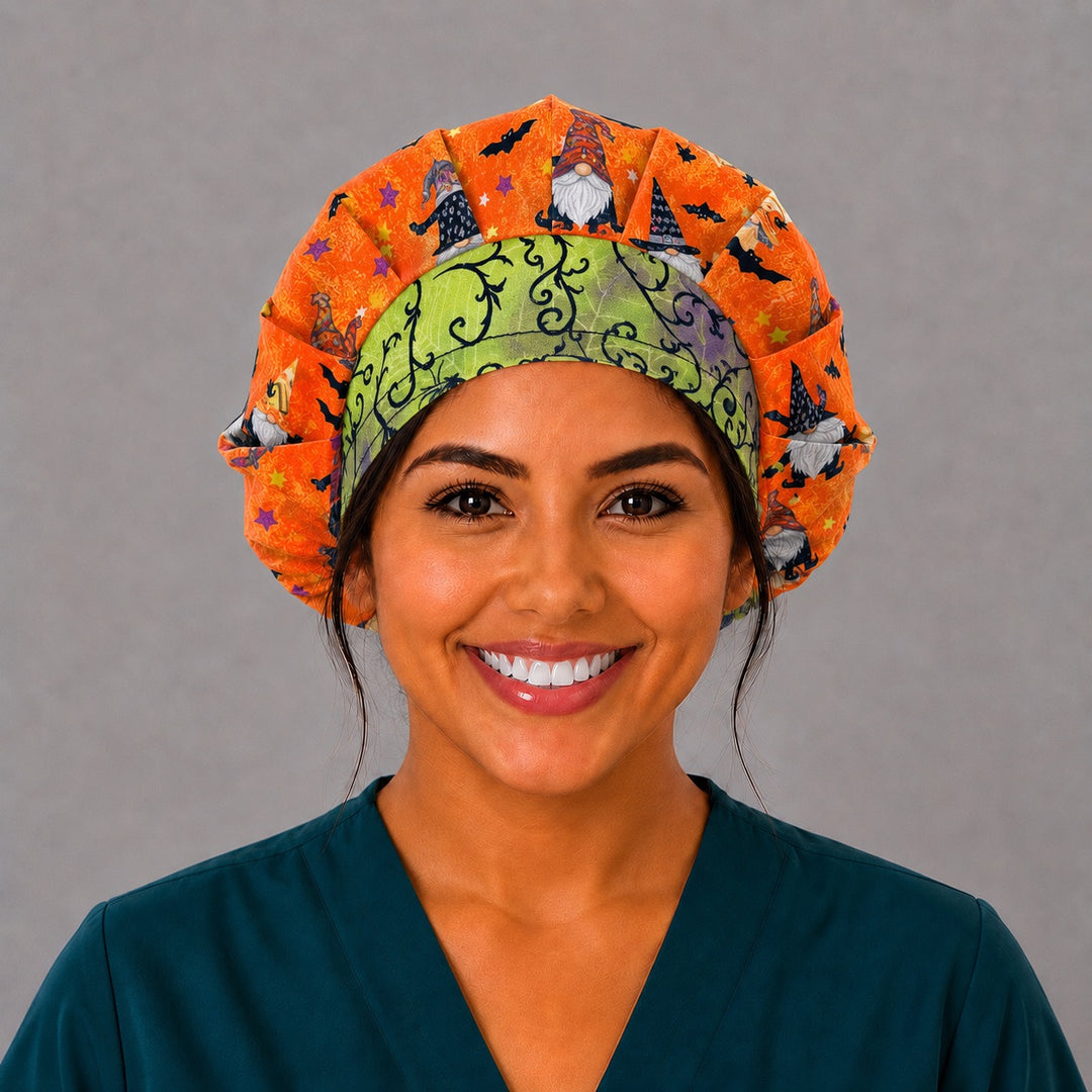 Angled view of the witch gnome bouffant surgical hat — green gothic vine contrast band with orange bat print, roomy cotton cap for nurses