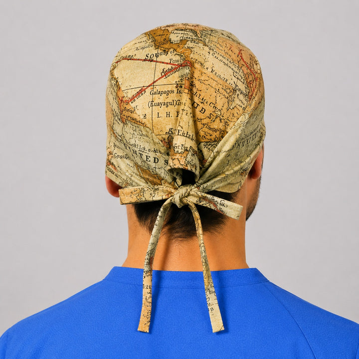 Back view of the vintage world map tie-back scrub cap — sepia travel atlas surgical cap, traveler nurse gift, adjustable fit