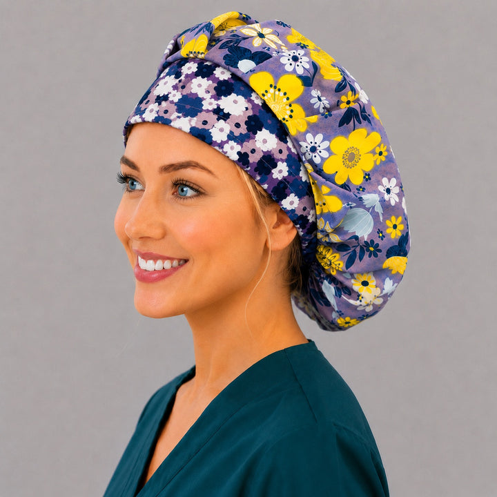 Yellow flower bouffant surgical cap for long hair, left side profile — deep gathered fit that secures thick or braided hair