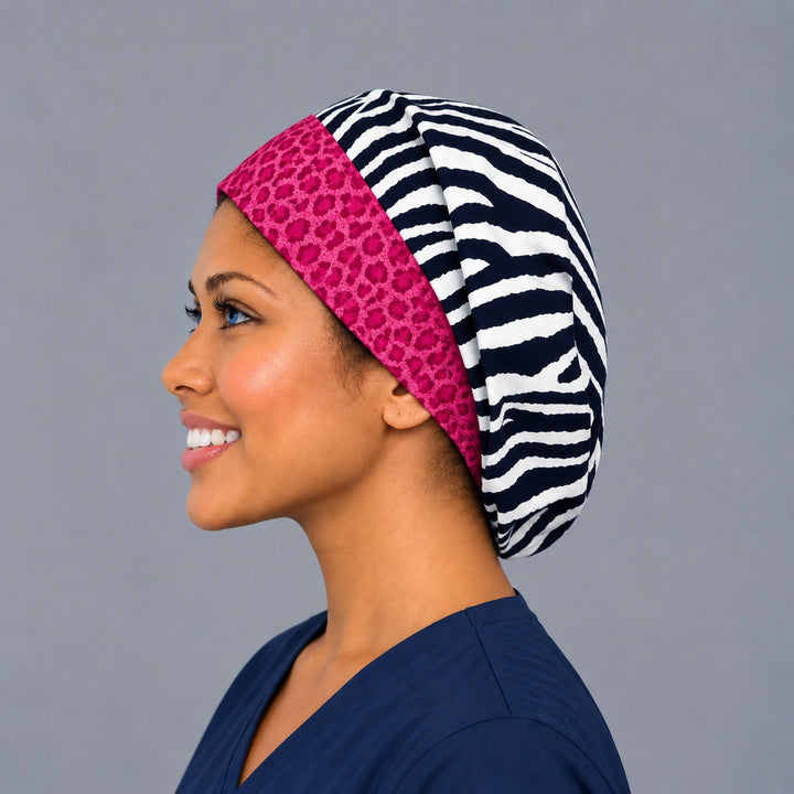 Left side profile of the zebra print Euro surgical hat — pink cheetah contrast band, breathable cotton cap for nurses