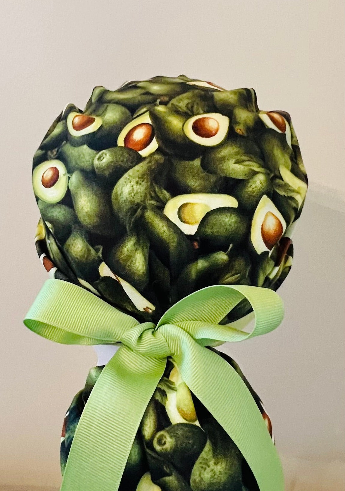 ponytail surgical scrub hat with green avocados - back